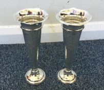 A pair of tapering silver spill vases. London. App