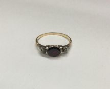 A good early Georgian garnet mounted ring with con