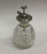 A silver and cut glass scent atomiser. Est. £20 -