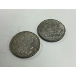 Two 1935 silver Crowns (coins). Est. £20 - £30.