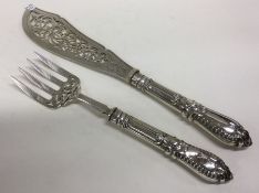 A heavy pair of Victorian silver servers. Sheffiel