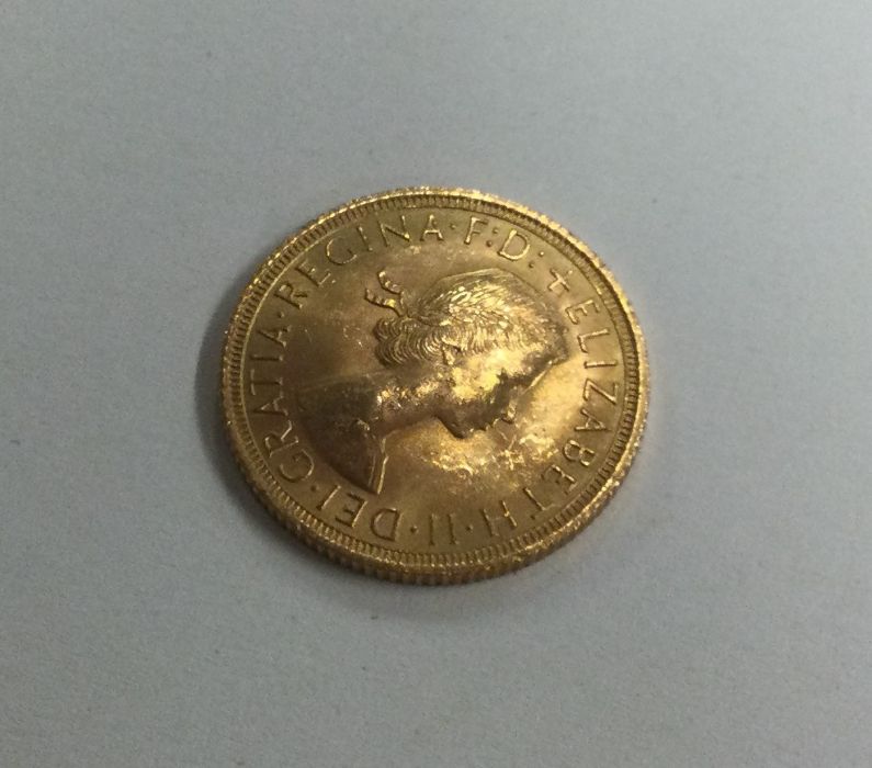 A 1963 full sovereign. Est. £300 - £350. - Image 2 of 2