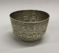 A large silver sugar bowl with reeded decoration.