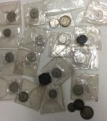 A quantity of silver coins. Est. £20 - £30.