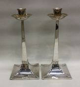 A stylish pair of Art Nouveau silver candlesticks.