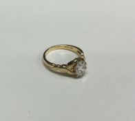 A 9 carat single stone ring in claw mount. Approx.