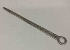 A modernistic style silver letter opener. Approx.