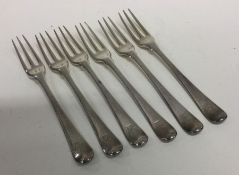 A set of six George II three prong silver forks. L