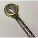 ROLEX: A lady's 18 carat gold wristwatch with silv
