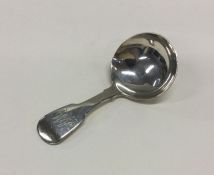 A George III silver caddy spoon. London circa 1820