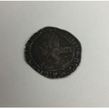 An early English silver coin. Est. £40 - £60.