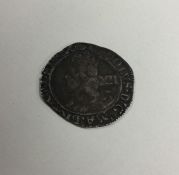 An early English silver coin. Est. £40 - £60.