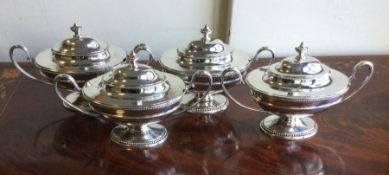 A set of four 18th Century sauce tureens crested w