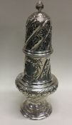 A heavy finely chased Victorian silver sugar caste