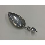 A pear shaped bright cut silver caddy spoon. Birmi