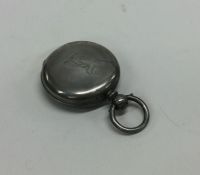 A plain silver sovereign case with loop top. Appro