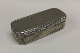 A William IV silver snuff box with engine turned d