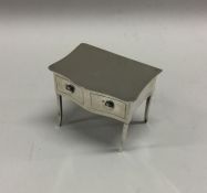 A novelty silver jewellery box with hinged lid. Ch