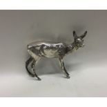 A heavy silver figure of a deer. Approx. grams. Es
