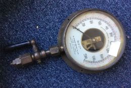 A large Automatic Sprinkler Co. pressure gauge.
