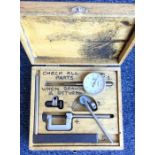 A box containing lathe tools, a 'Mercer' dial gaug