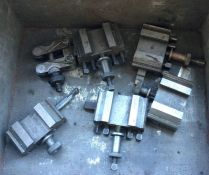 A set of five quick change tool holders.