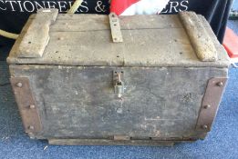An old large wooden barn trunk.