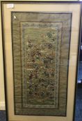 An Oriental silk tapestry. Approx. 64cms x 34cms.