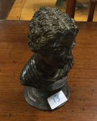 A bronze cast bust of a lady. Approx. 18cms in height.