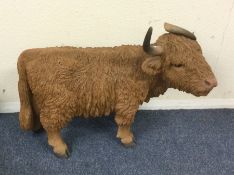 A large figure of a Highland cow.