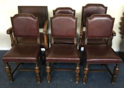 A set of five plus one oak dining chairs.