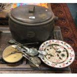 An old cast iron cooking pot etc.