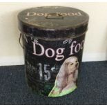 A large painted dog food container.