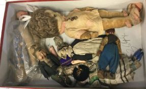 A collection of old dolls.