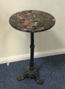 A marble top occasional table.