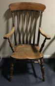 A pine Windsor chair.
