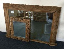 Two good oak carved mirrors.