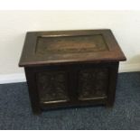 An Antique oak hinged top box.