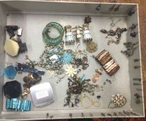 A collection of earrings and costume jewellery.