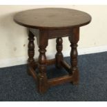 An oak occasional table.