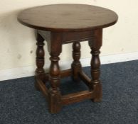 An oak occasional table.