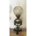 An old brass oil lamp.