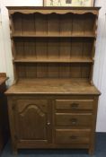A good oak three drawer dresser with panelled back