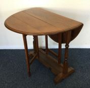 A small drop leaf table.