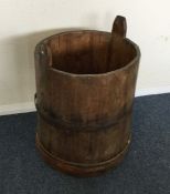 A large circular wooden pail.