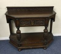 A large oak single drawer hall table.
