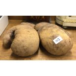 A pair of vintage boxing gloves.