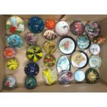 A collection of glass paperweights.