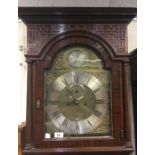 A good mahogany Grandfather clock with brass dial.