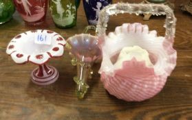 Cranberry glass items.